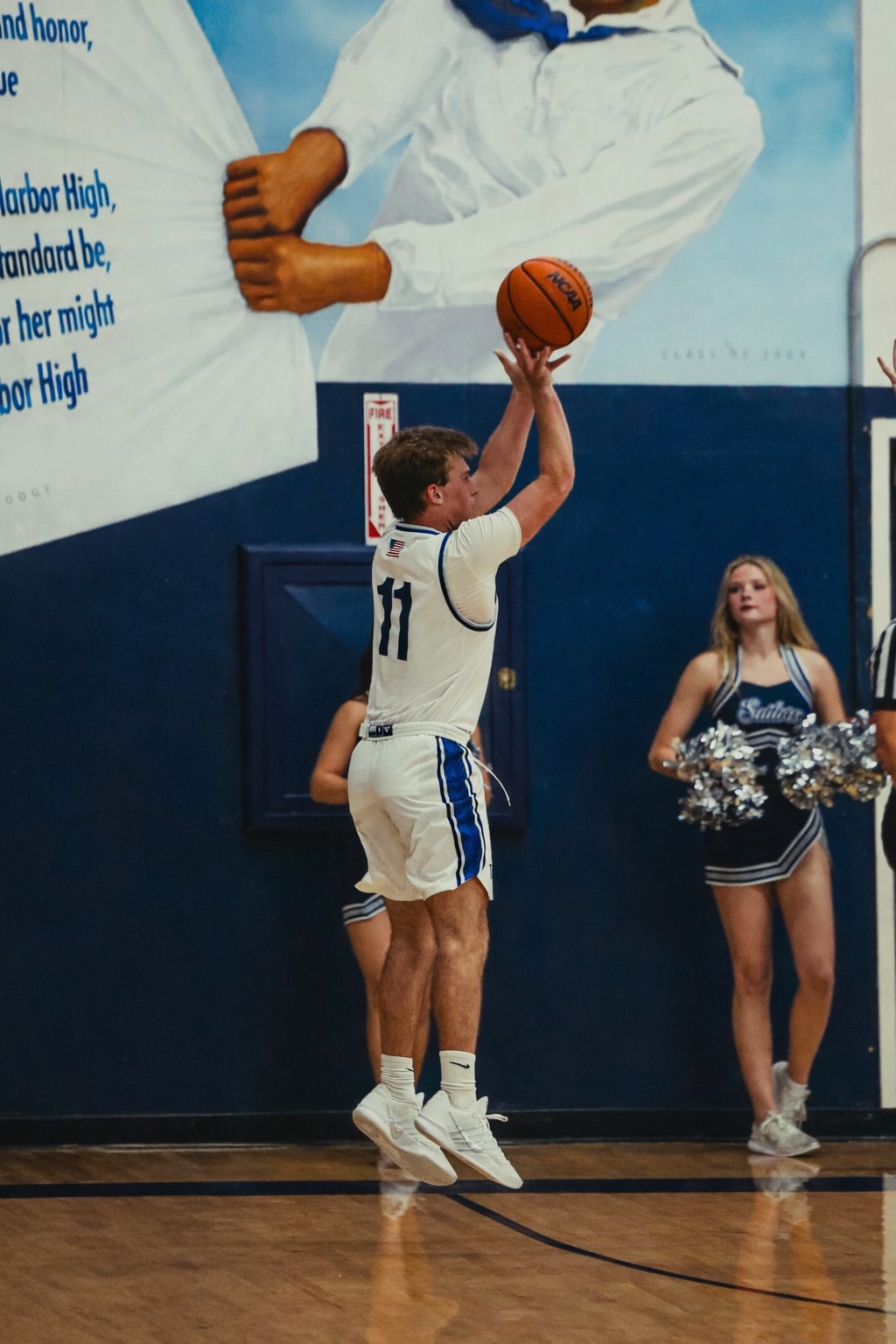 cade 3 in front cheerleaders